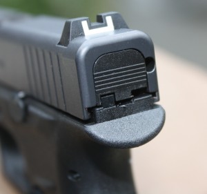Rear sight of the G42 is dovetailed and has a white outline square notch. Notice the upper rear of the frame and the nice beavertail effect. Author photos
