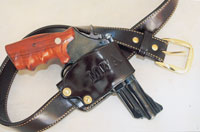 -screw pre-27 is “barbecue ready” in custom Galco holster and matching dress gun belt.