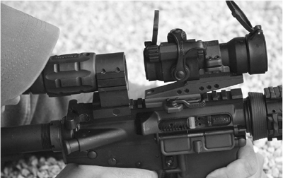 The Aimpoint with the twist-off 3X adapter, being used to slam LaRue targets far downrange.