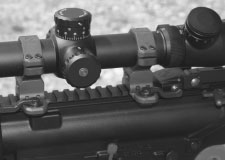 Leupold Mark Scope on Armalite SASS. The Leupold Mark Scope has half-minute windage and one-minute elevation adjustments with easy-to-read numbers. The A.R.M.S. quick detachable rings allow the scope to be easily removed to access peep sight system and replaced to zero.