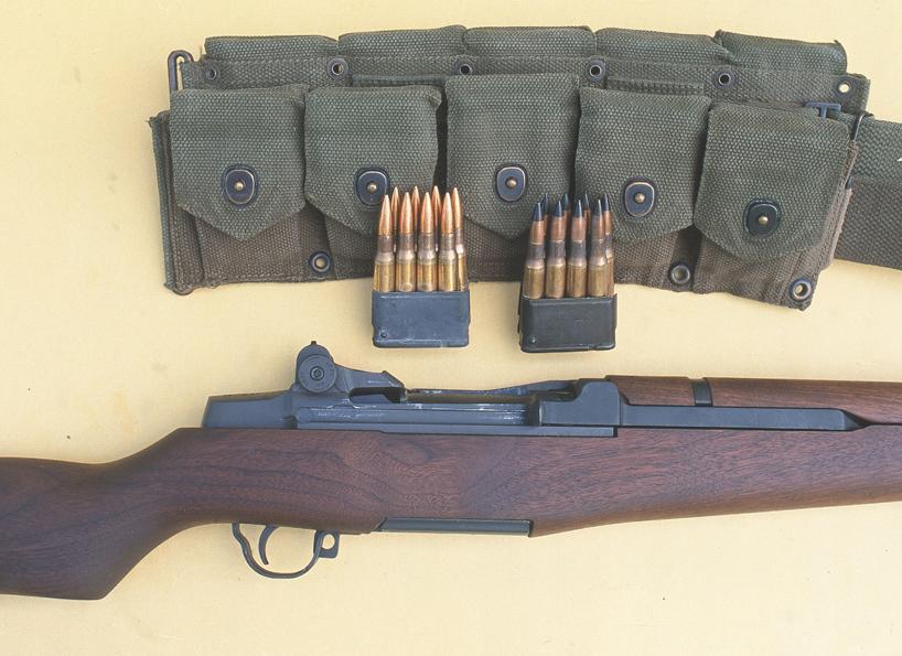 Author's service-grade M-1, shown here with a WWII ammo belt, a clip of ball ammo and a clip of black-tipped armor piercing (AP) ammo. 