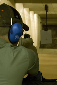 Personal Protection Academy students qualify on the indoor range and get expert “hands on” instruction to improve stance, grip and trigger control.