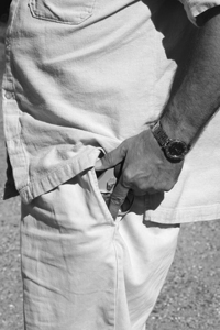 …to allow for tight pockets and spurred hammers, thumb takes this position. It dramatically reduces hand’s thickness profile, thus reducing chances of a snag. It also turns the thumb into a hammer shroud for conventional-hammer revolvers…
