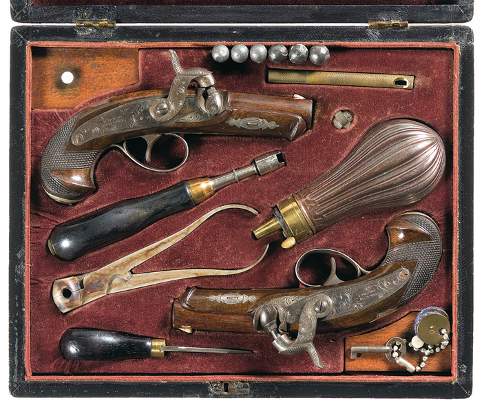 Superb cased, engraved and gold banded pair of Henry Deringer percussion pistols with coin silver furniture   sold $43,125