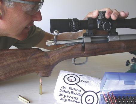 Wayne adjusts a Nightforce scope on a super-accurate Dakota Predator rifle in 20 Tactical.