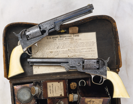 Matched pair of presentation, engraved, ivory-grip MANHATTAN 36-caliber percussion, 5 shot-revolvers with 6 1/2-inch barrels. Each handsomely inscribed along their backstraps:  “to G. W. France Acting Assistant Surgeon, U.S.A. / from Attendants of U.S. Gen. Hospital No. 11.”  Illustrated here with a Civil War Army issue Hospital Steward’s (Corpsman) medicine case as worn on a waist belt.  Dr. France served as a surgeon at a Prisoner-of-War camp outside Nashville during the Civil War; following cessation of hostilities he continued duty 1865 to June, 1866 at Army posts in Oregon Territory.
