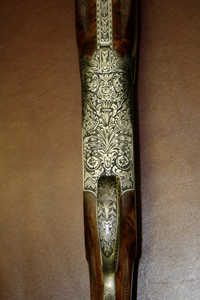 This D5G inspired pattern engraved by Ron Reimer offers full coverage engraving. You must look closely to see the barrel and cocking lever when the action is closed. 