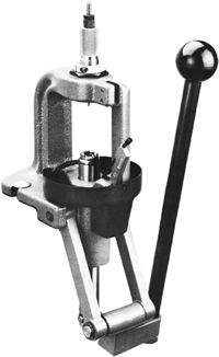 The primer seater, as shown on this RCBS Rock Chucker, is usually included as part of the press, but if you get used equipment, be sure all parts are there.