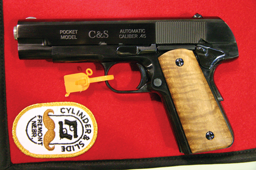 Bill Laughridge and his “pocket” .45. He took a regular 1911, and turned it into a “hammerless” model compact=