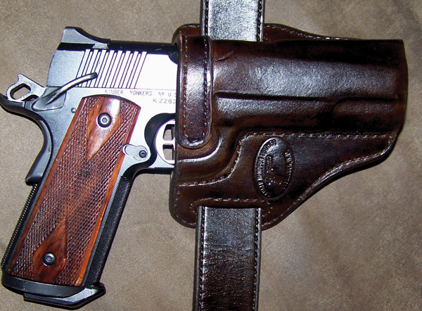 The Haugen Handgun Leather crossdraw holster offers excellent fit and finish and good design, all we may ask.