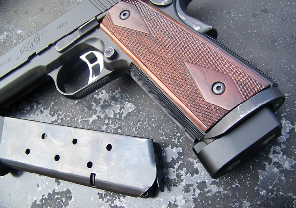 The D & L Sports heavy duty magazine worked well with the Kimber magazine guide. 