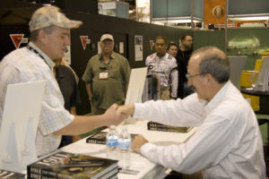 Patrick Sweeney Signs Copies of 1911: The First 100 Years at SHOT Show 2011