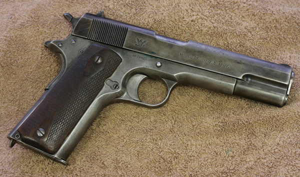 Springfield, as a government arsenal, had its own markings. Here you see the American Eagle on the slide of a Springfield 1911.