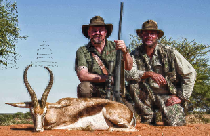 The author and Maré van der Merwe with an exceptional springbok in Namibia, taken at 300 yards with the .280 Ackley Improved. 