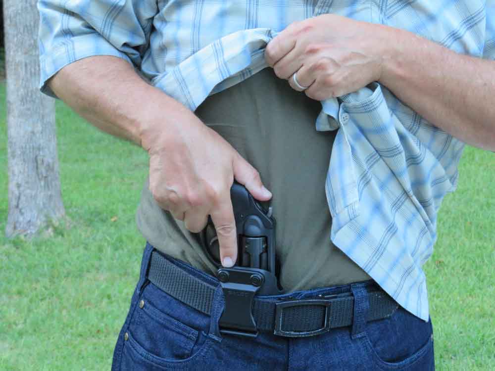 Concealed Carry Pistol Being Drawn