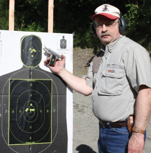 Workman at the range with a Colt Mustang Pocketlite in .380 ACP. That target was set at 15 yards from the firing line.