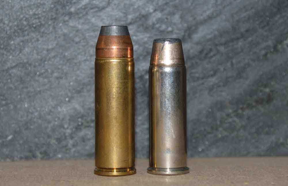 .454 Casull Cartridge next to a .45 Colt