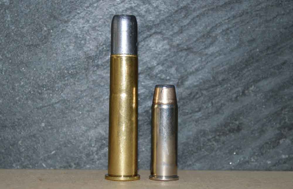 .45-70 Govt. cartridge next to .45 Colt