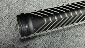 Here’s a look inside a silencer. The design and construction of a suppressor involves baffles welded inside of a tube.