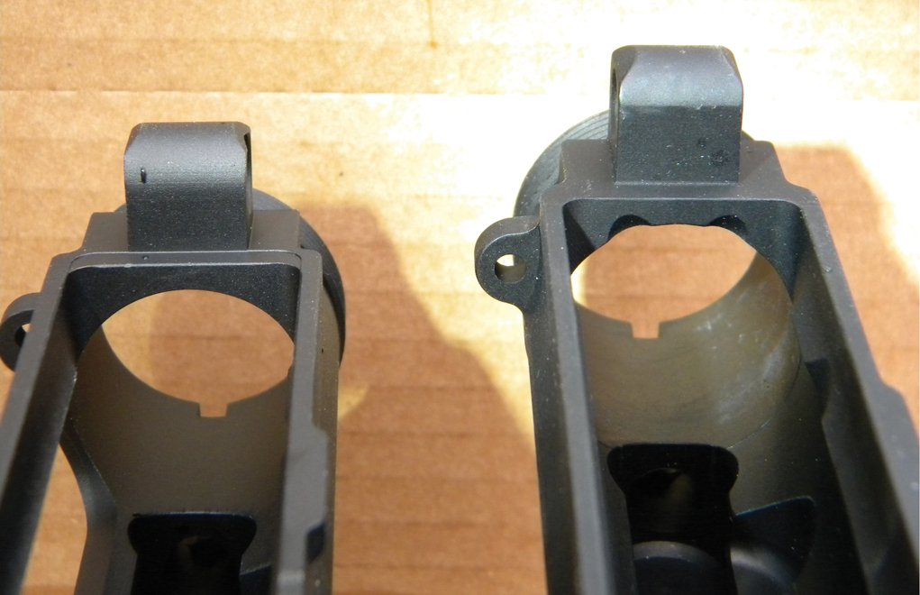 The receiver on the left is cut for M4 feed ramps. This provides a smoother transition for the round to feed from the magazine into the chamber. At right, the receiver is a “rifle” receiver, or older-style AR. This design can cause feeding problems with some types of ammo.