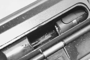 A malfunction we never saw in the old days. Here, the bolt has broken at the cam pin hole, stopping the rifle.
