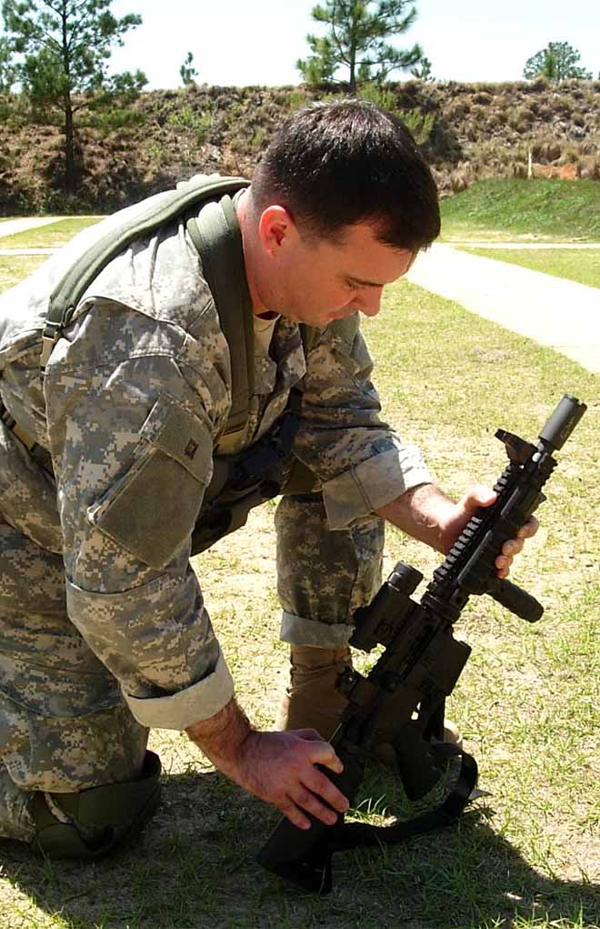 The Type IV AR-15 Malfunction is a case stuck in the chamber. To clear this, you have to bang the rear of the stock against something solid while pulling back on the charging handle. This generates the force needed to pull the case free—or it will rip it, which means it’s going to take time and tools to fix.