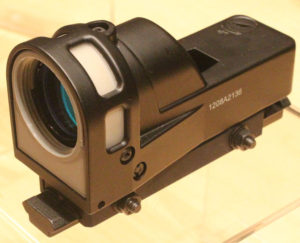 This Meprolight reflex sight uses no power source except what can be taken from the wild outdoors. Sort of. It works during the day with fiberoptics, with light from the sun. At night, it illuminates using Tritium, derived from seawater.