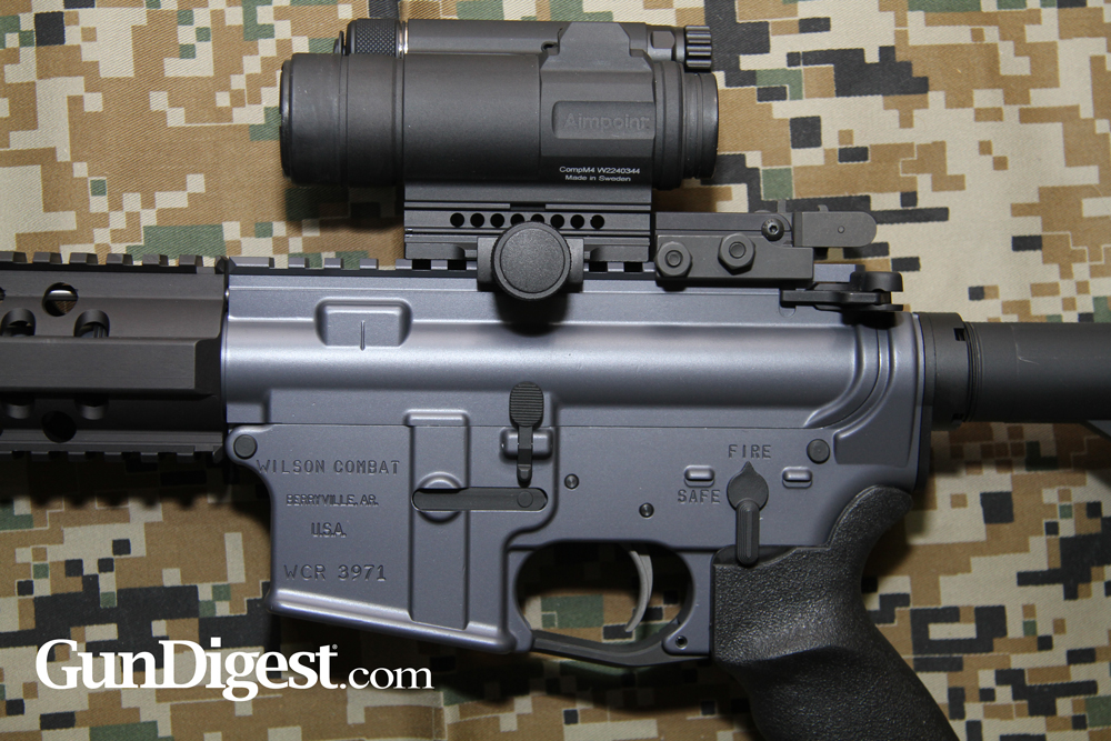 One of the Wilson 6.8 rifles, here with an Aimpoint M4 on it. You’ll note that the Wilson BUIS doesn’t crowd the Aimpoint, and when it flips up the Wilson BUIS won’t bang the M4.