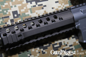 The Wilson handguard, with the rear rails shaved off. It proves a less “bite-y” gripping surface and also gives you an oval to index the rifle vertically.