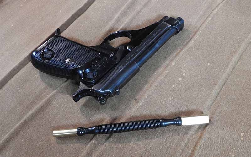 Beretta Model 70 with sight adjustment tool