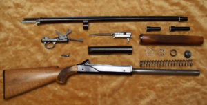 The Breda was the only autoloading shotgun made that could be disassembled without the use of screwdrivers or other tools. All the parts are interlocking and do not require screws.