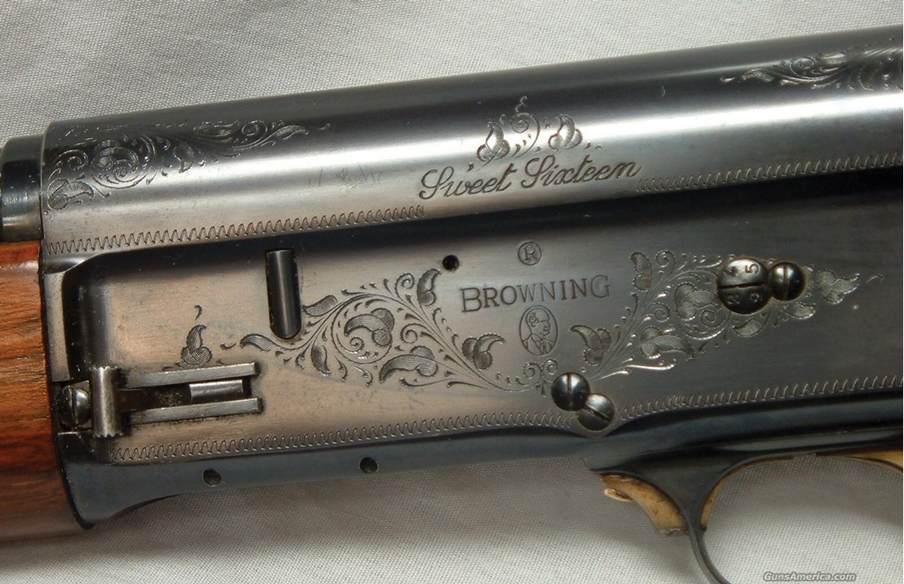 An engraved Auto 5. 