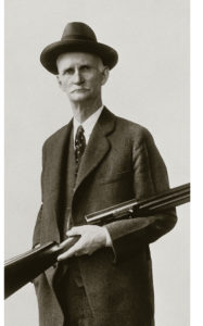 John Browning with one of the greatest Browning shotguns of all time, his legendary Auto-5. Courtesy Browning.