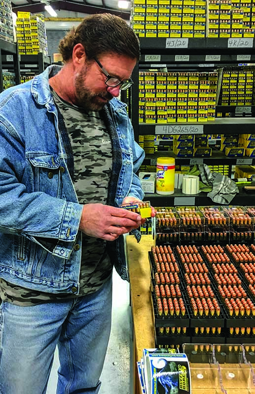 Buffalo Bore’s Tim Sundles inspects a recent run of the company’s ammunition.