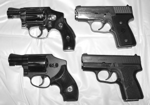 Sometimes it’s easier, and even more efficient, to carry two small handguns of adequate power instead of one large one. Left: 20 ounce Model 640-1 above, 15 ounce Model 442 below, both J-frame 5-shots by Smith & Wesson. Right: 22 ounce all steel Kahr MK9 above, 14 ounce polymer frame MK9 below, both 7-shot 9mms.