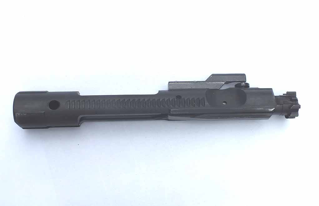 The rotary bolt on the CMMG Guard series is angled with matching lugs in the barrel. Recoil pressure rotates the bolt and unlocks the carrier, delaying the system and allowing a much lower reciprocating mass of bolt and carrier.