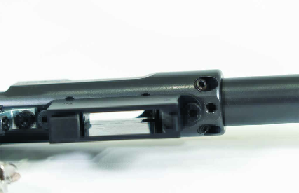 The underside view of the 457 receiver shows the two grub screws that index and secure the barrel. Unscrew and the barrel can be swapped out easily. 
