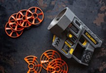 Caldwell ClayCopter Review: The Next Evolution Of Shotgun Fun A Caldwell ClayCopter Hand-Held Thrower next to its special clays on a black background.
