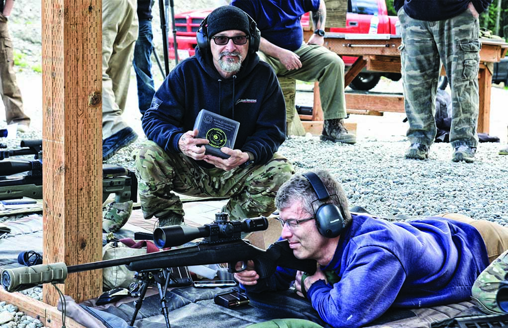 A student with a Harris bipod shoots under the watchful eye of the instructors. The proof is in the groups, which—from a factory rifle—are outstanding. 