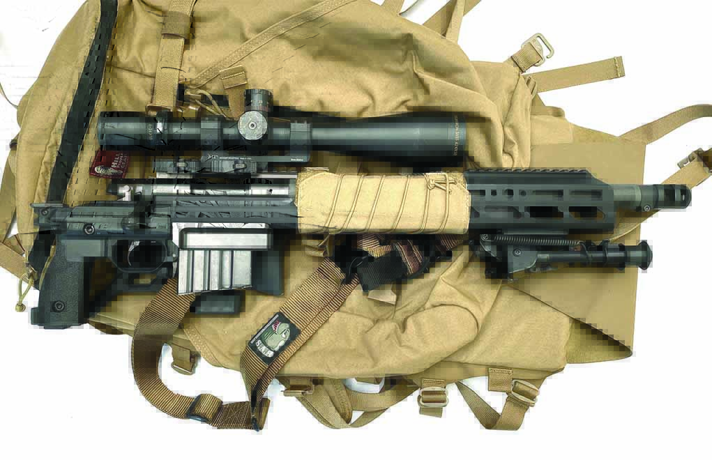 The short, thick carbon-fiber barrel on this compact precision rifle build makes it so that it’s well-balanced and can fit just about anywhere. The heat-resistant SHTF+ wrap from KE Arms keeps rapidly dissipating heat away from the optics and the aluminum KRG forend during long strings of fire. It’s so small that it can drop right into a Hill People Gear pack and away you go!