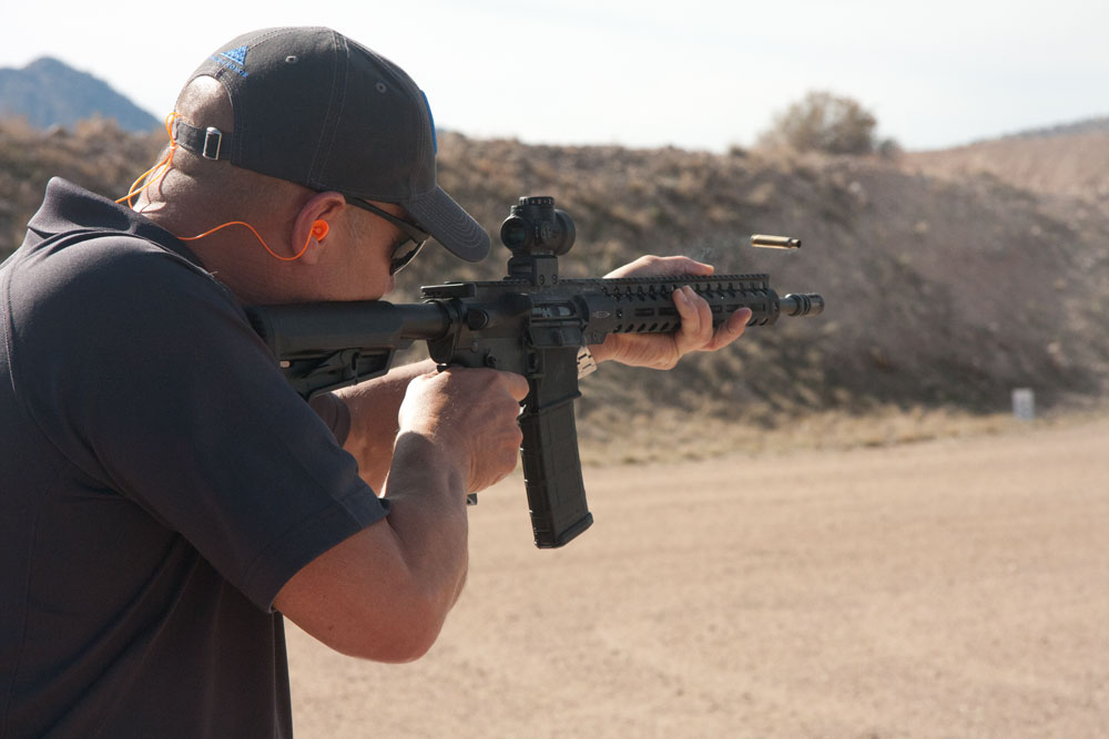 Running through AR-15 drills at the range.