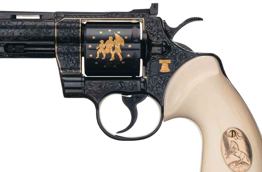 A Colt Python .357 Double Action Revolver. A fantastic piece of Colt firearm art by famed Master Engraver Howard Dove (1942-1994). Dove signed this extensively engraved and gold embellished masterpiece