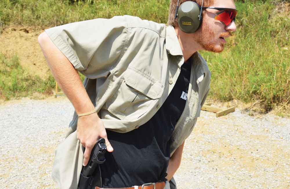 The shooter is keeping the eyes forward toward the target while drawing the pistol from the holster, knowing his natural point of aim.