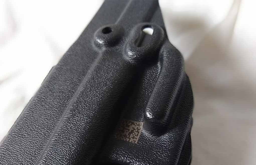 A clever design, the finger on the IWB holster keep your gun close into your side and under cover. Note the holes above, it's ambidextrous, too.