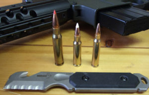 The 6.8 fits well ballistically between the 7.62mm NATO (shown with 110 gr. Hornady TAP) on left, and 77gr. Wilson Combat 5.55mm BTHP on right. The 6.8 has a 110 Gr. Nosler Ballistic Tip bullet from Silver State Armory. The ammo is shown with the 6.8 Recon Rifle and Wilson Combat COP Tool.