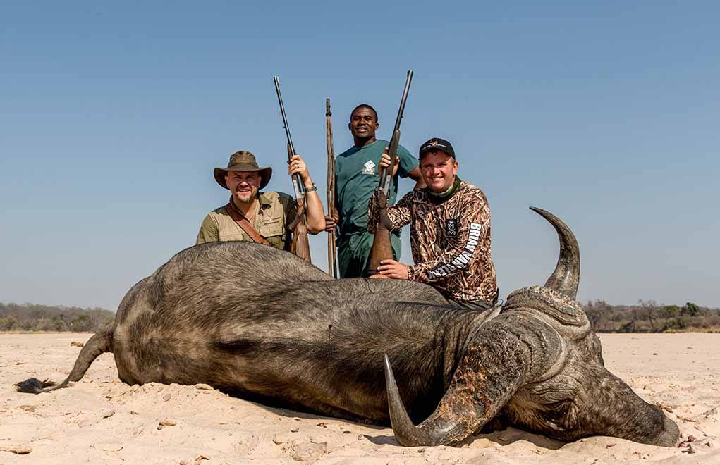 The author with PH Brian van Blerk, with a good Zimbabwean buffalo taken with an iron-sighted .470 NE double. 