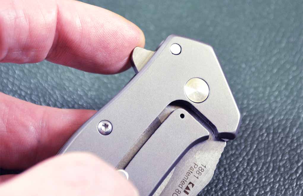 The Kershaw Eris has features that the higher-priced Inkosi does not, such as the flipper opener shown here. It also employs spring assist to roll the blade out in a flash.