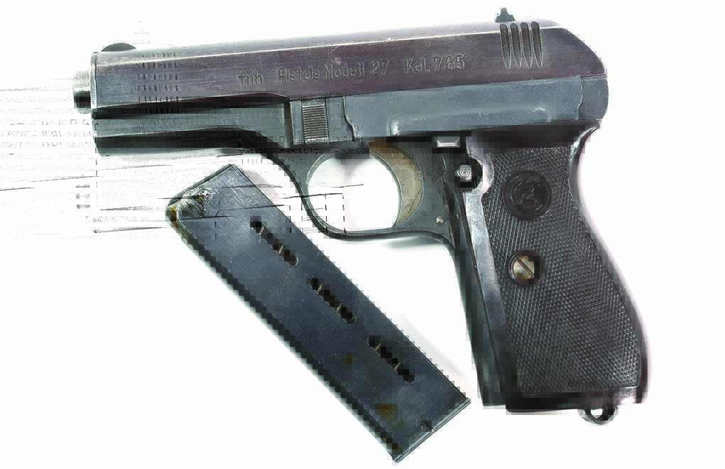 Yep, eight shots of .32 ACP at the ready—and with a spare magazine buried in the full-flap holster, too. Not a true German pistol, but used by the nation in World War II and a great collector's piece.