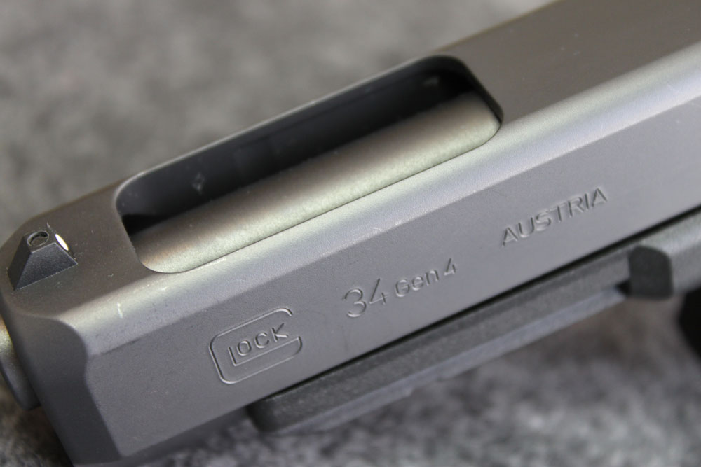 Glock machined out the slide to keep the weight the same as the G17. A change of more or less weight will affect the cycle speed, which decreases reliability.