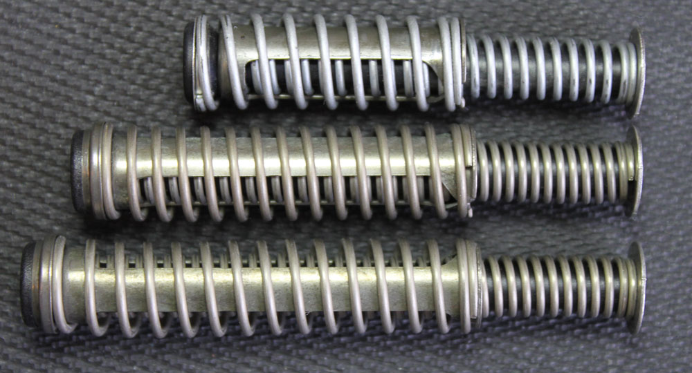(Top to bottom): G26, G19, and G17. The difference in weight of the three different slide springs isn’t a lot, either.